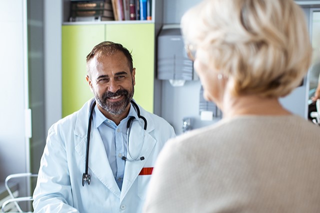 physician talking to a patient