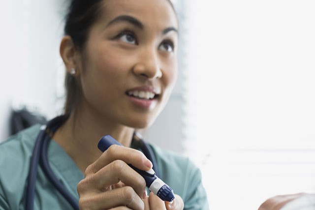 nurse with insulin shot