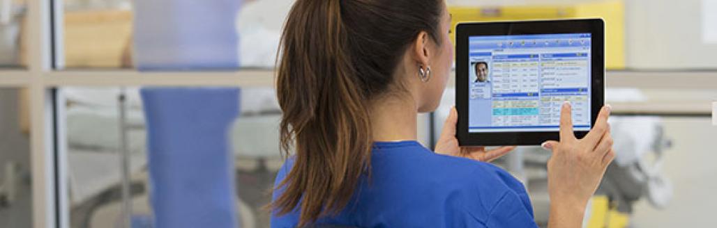 clinician with an ipad