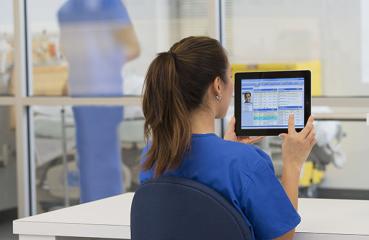 clinician with an ipad
